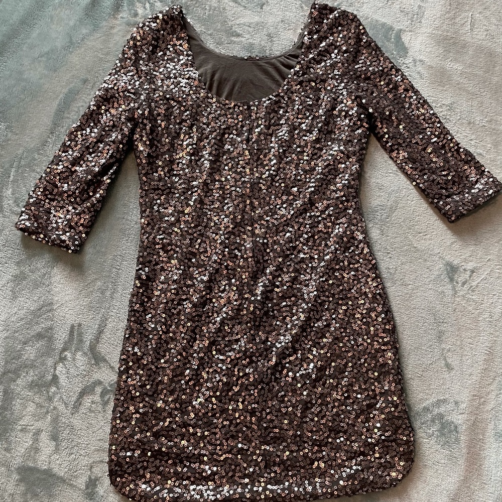 Silver sequined cocktail dress with draped back